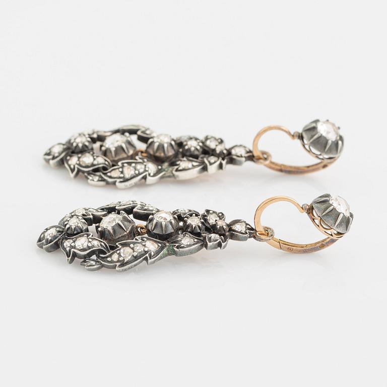 A pair of 19th century silver earrings set with rose-cut diamonds.