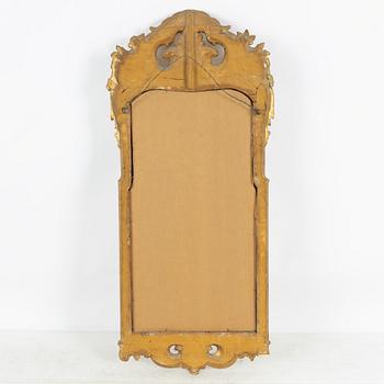 A Rococo style mirror, first half of the 20th Century.