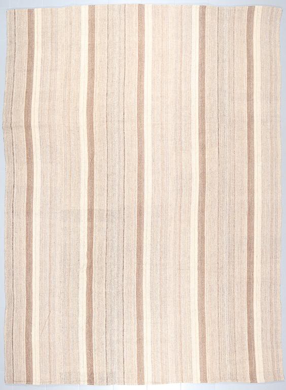 A FLATWEAVE RUG, 343 x 242 cm.