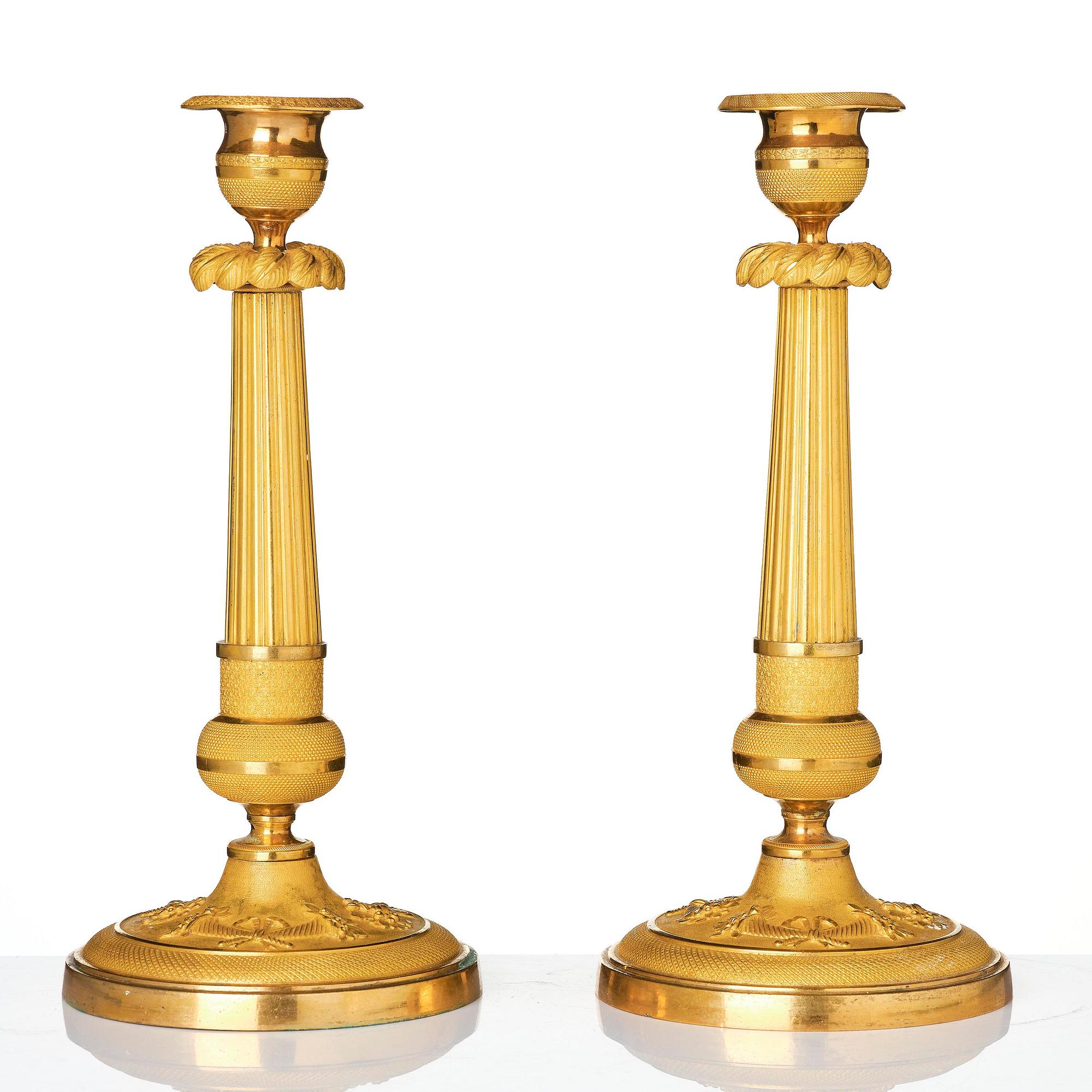 A pair of Empire ormolu three light Candelabra.