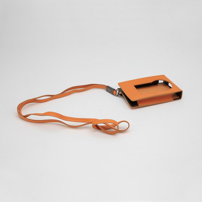 TOD'S, a lilac leather "D-Bag" and orange leather cellphone case.