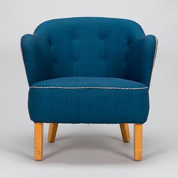 Flemming Lassen, an armchair manufactured by Asko 1952-1956.