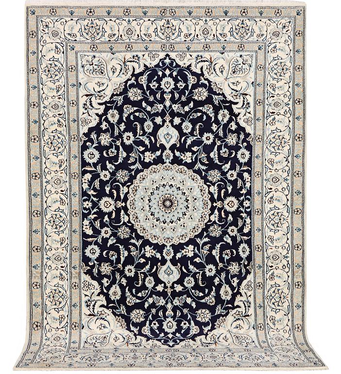 A part silk Nain rug, 9LA, c. 292 x 190 cm.