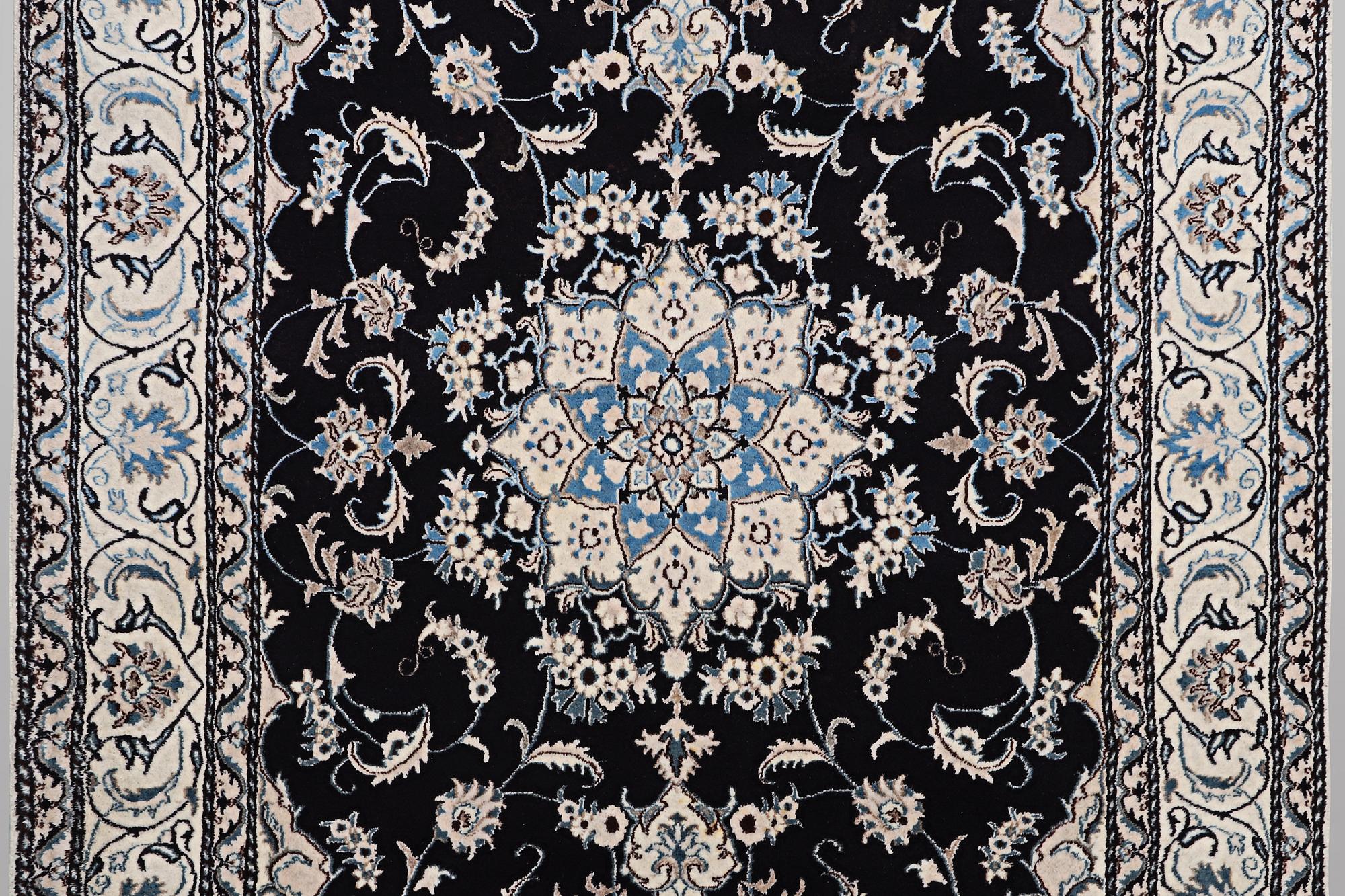 A carpet, Nain, part silk, ca 9 laa, ca 290 x 194 cm.