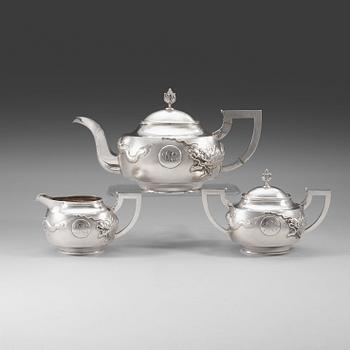 446. A Chinese three-piece silver tea set, unidentified master, early 20th Century.