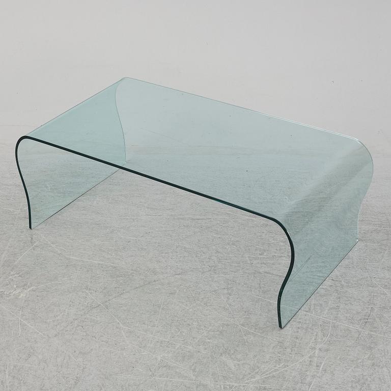 A mid 20th Century glass coffee table.