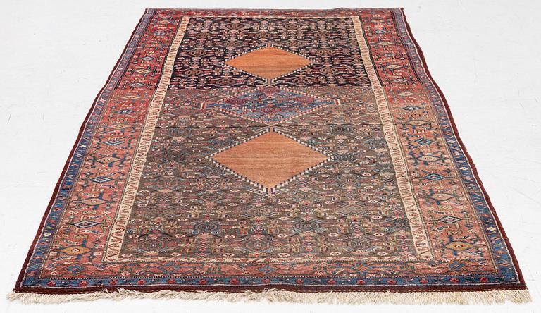 A semi-antique Bidjar rug, c. 255 x 135 cm.