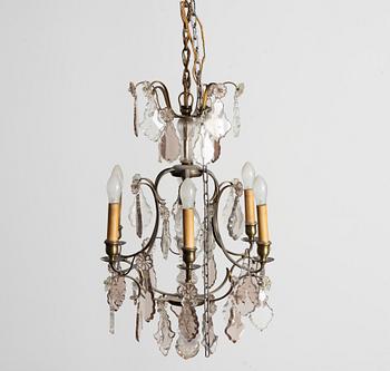 Takkrona, rokokostil, tidigt 1900-tal.