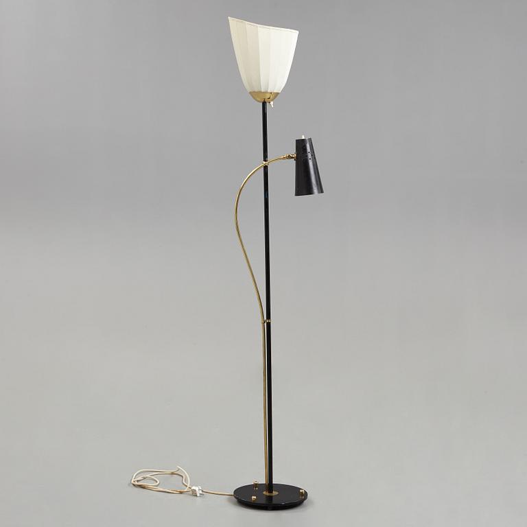A Swedish Modern brass and black lacquered floor lamp, 1950's.
