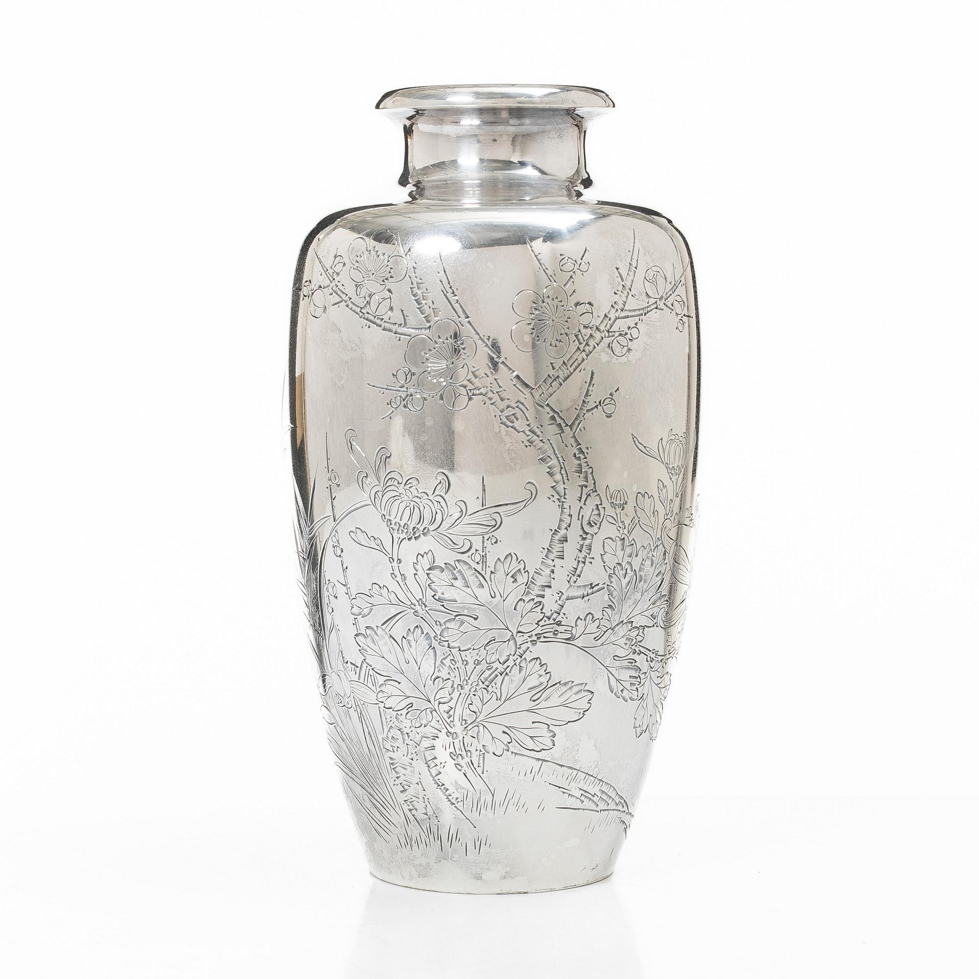 A silver vase, Japan, Meiji (1862-1912) or Tiasho (1912-1926).