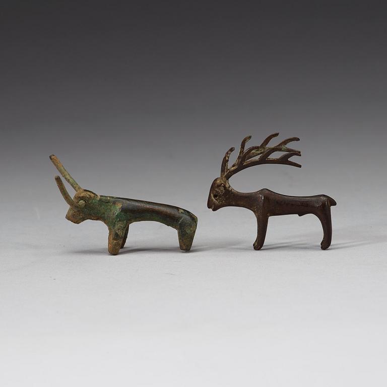 Two bronze figures in the shape of a bull and a stag, presumably Scythian, about 700 B.C. - 200 A.D.