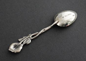 22 swedish silver spoons and one ladle, from the 19th and 20th century.