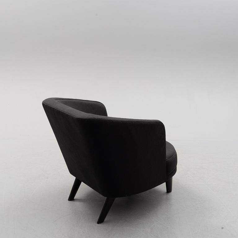 A Jonny Johansson upholstered sofa, Acne Studios, O.H. Sjögren, Tranås, Sweden 2010.