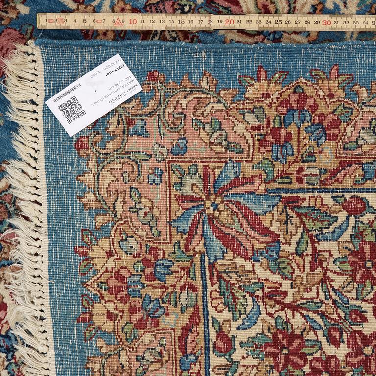 A semi-antique Kerman carpet,  440 x 296 cm.