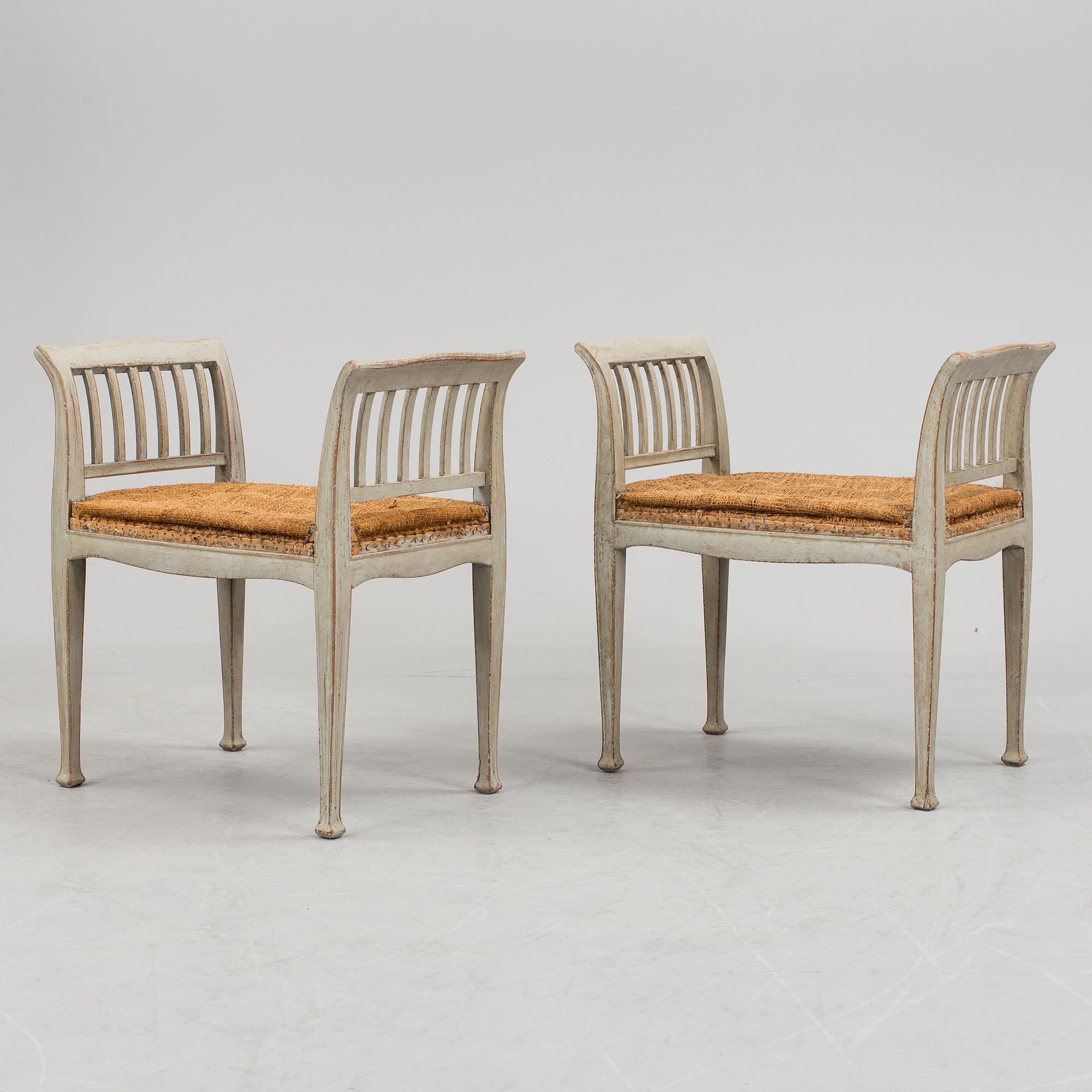 A pair of earlt 20 th century stools.