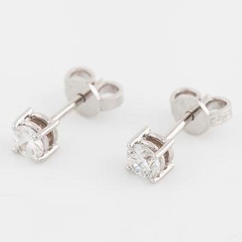 A pair of brilliant cut diamond earrings, ca 0.50 ct in total.