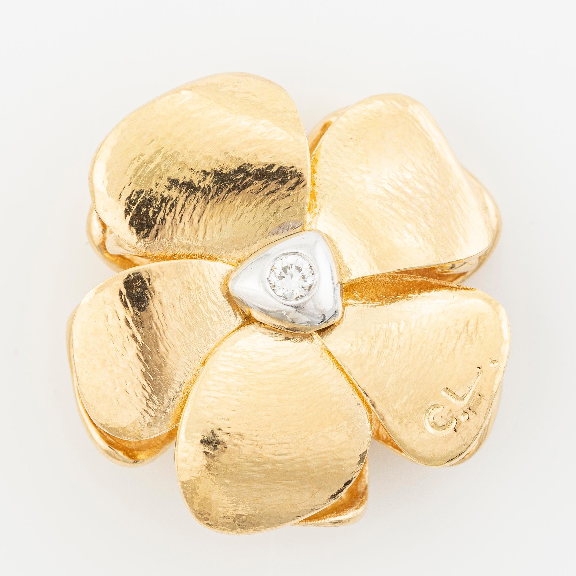 Ole Lynggaard, Charlotte Lynggaard, Lås, 18K guld med briljantslipade diamanter, i form av blomma.