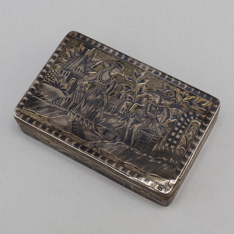 A Russian mid 19th century silver-gilt and niello snuff-box, mark of Moscow.