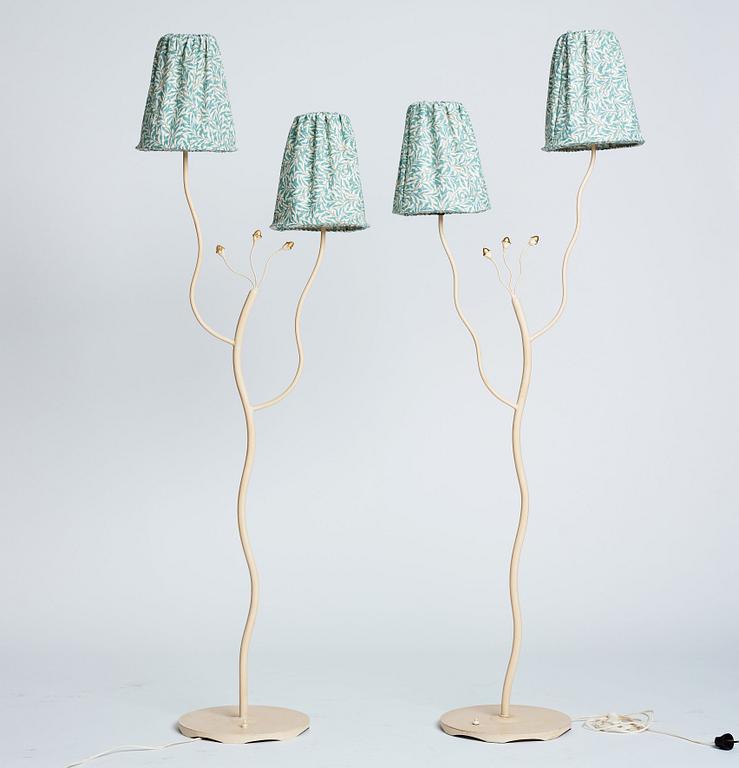 Swedish Modern, two lacquered metal floor lamps, 1940's-50's.