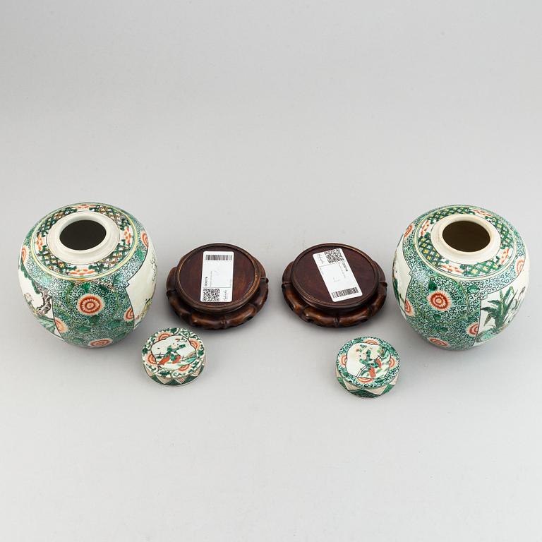 A pair of Chinese famille verte jars with covers, 20th century,