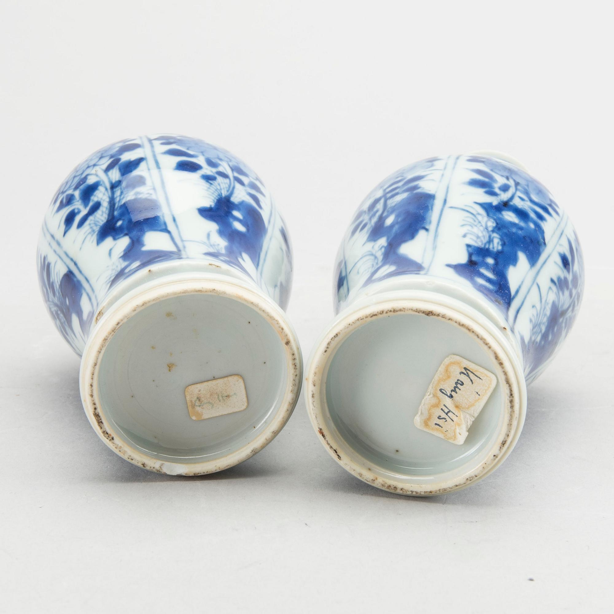 A set of two pairs of Kangxi and Kangxi style blue and white porcelain vases.
