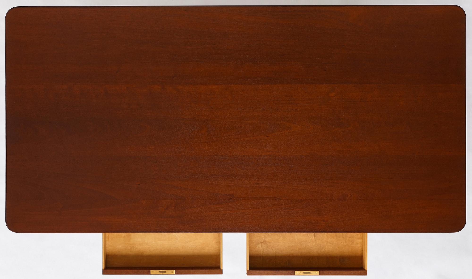 Mogens Koch, an important free standing mahogany desk by N.C. Jensen Kjær, Denmark 1930's.