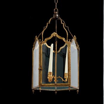 A Louis XV-style three-light lantern, 19th century.