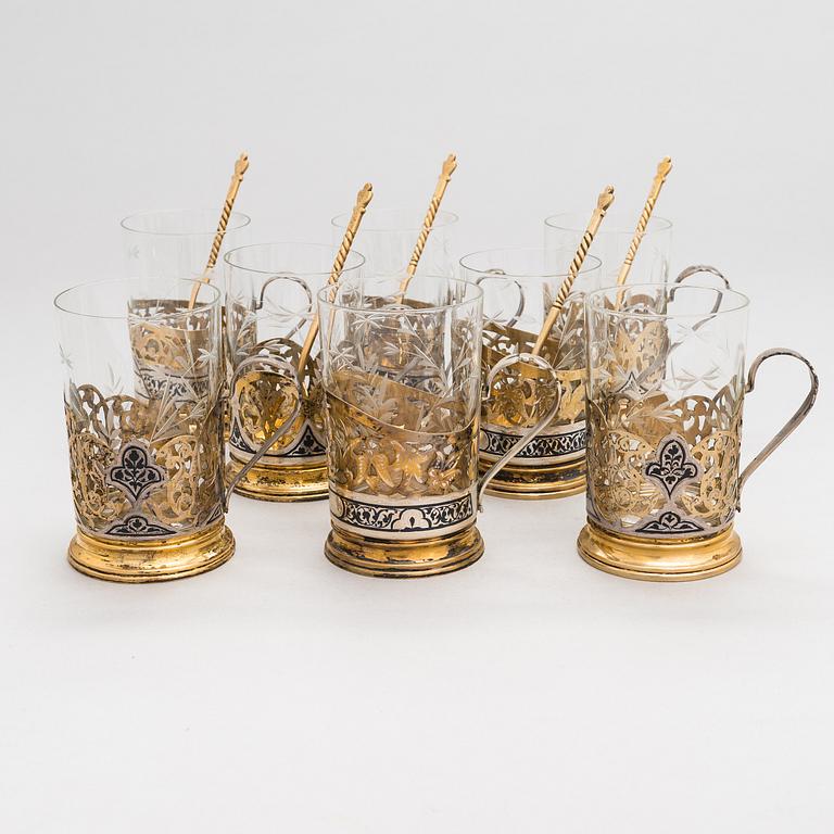 A set of eight Kubachi tea glass holders and five teaspoons, parcel-gilt silver, niello, Russia 1960s.