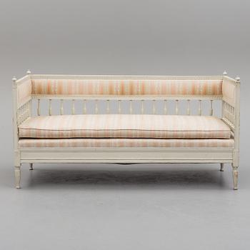 An early 19th century painted late Gustavian sofa.