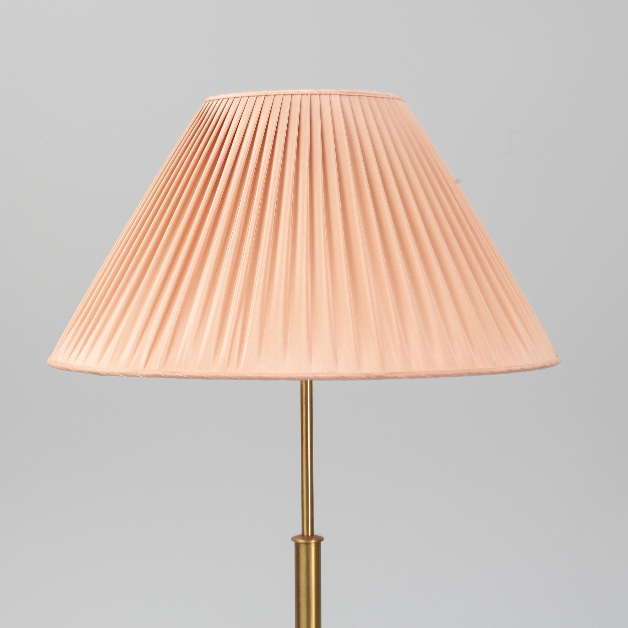 Josef Frank, a model 2148 brass floor light, Svenskt Tenn.