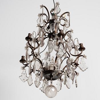 A Rococo style chandelier, early 20th century.