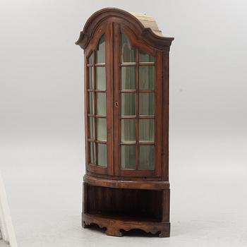 A Rococo Display Cabinet, 18th Century.