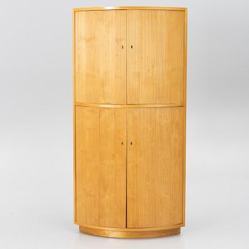 Corner cabinet, circa the mid-20th century.
