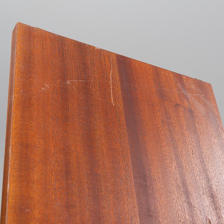 A 'String" bookcase, designed by  Nils Strinning,