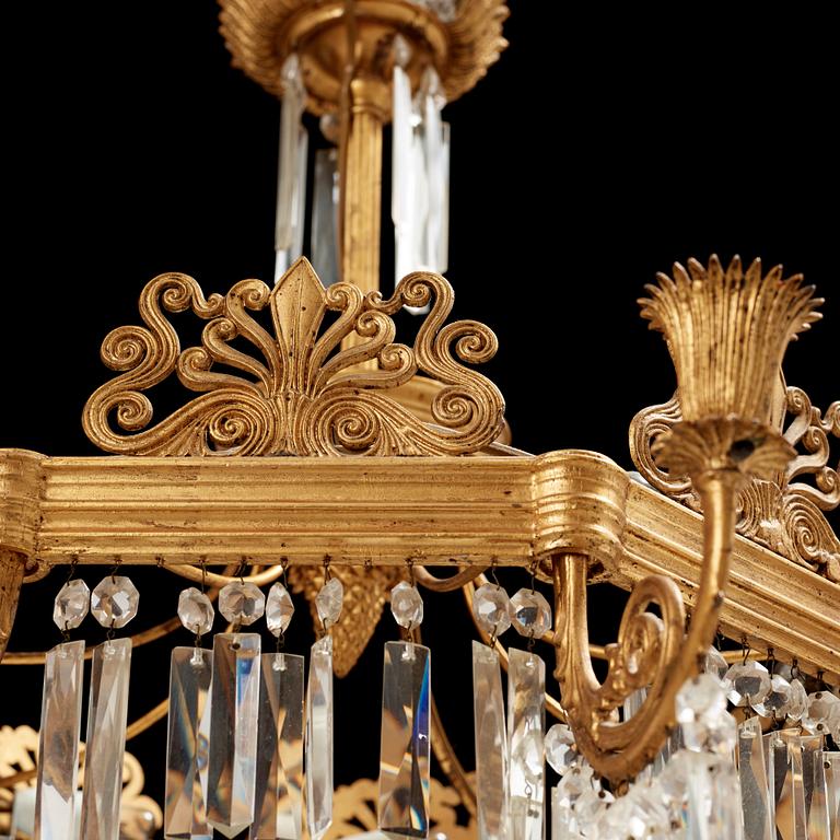 A German 19th century eight-light chandelier in the manner of Karl Friedrich Schinkel.