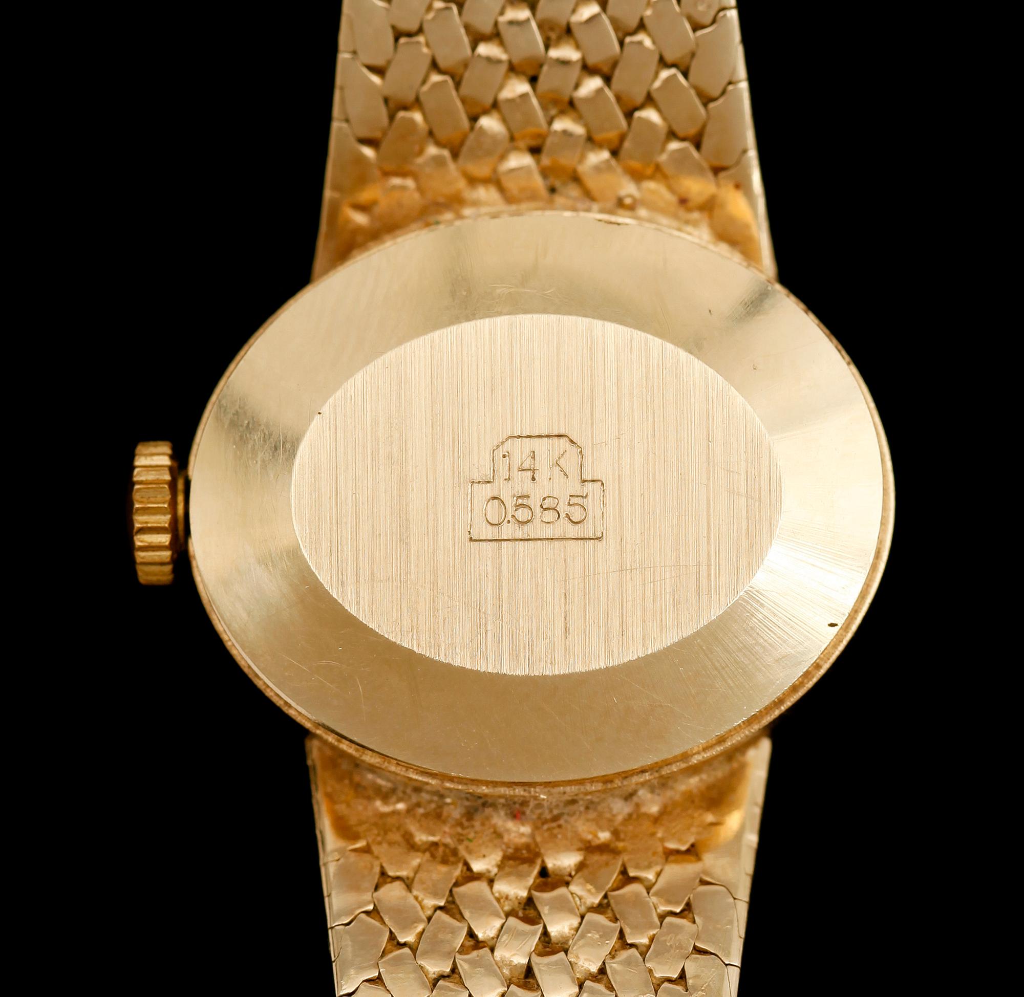DAMARMBANDSUR, 14 k, E Bucherer 17 jewels Incabloc. Total vikt med urverk ca 30 g.
