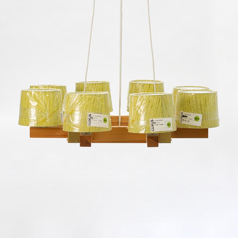 Uno & Östen Kristiansson, a pine wood ceiling lamp, Luxus, Vittsjö, Sweden.
