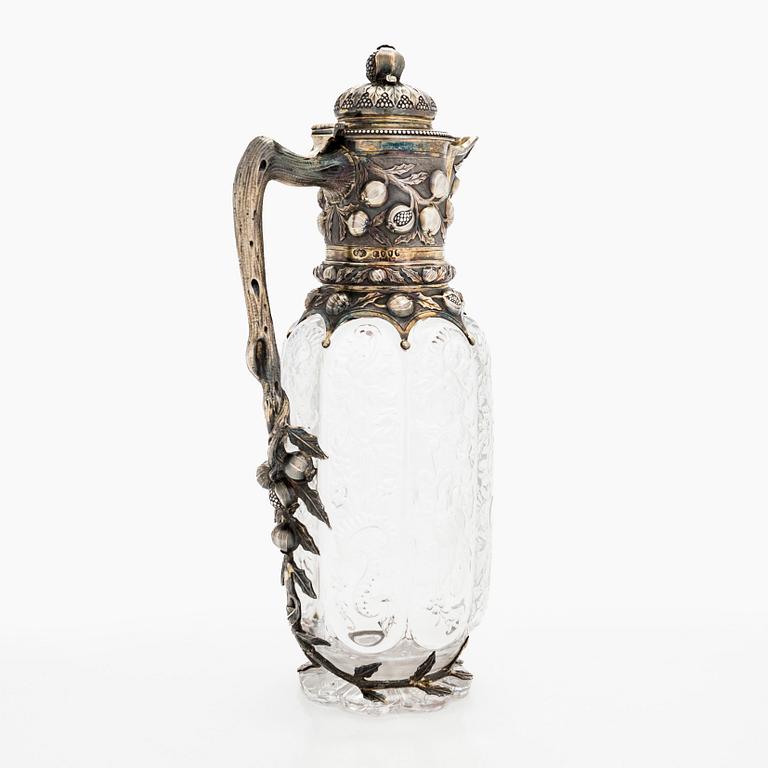 A silver mounted glass ewer, Elkington & Co, London 1884.