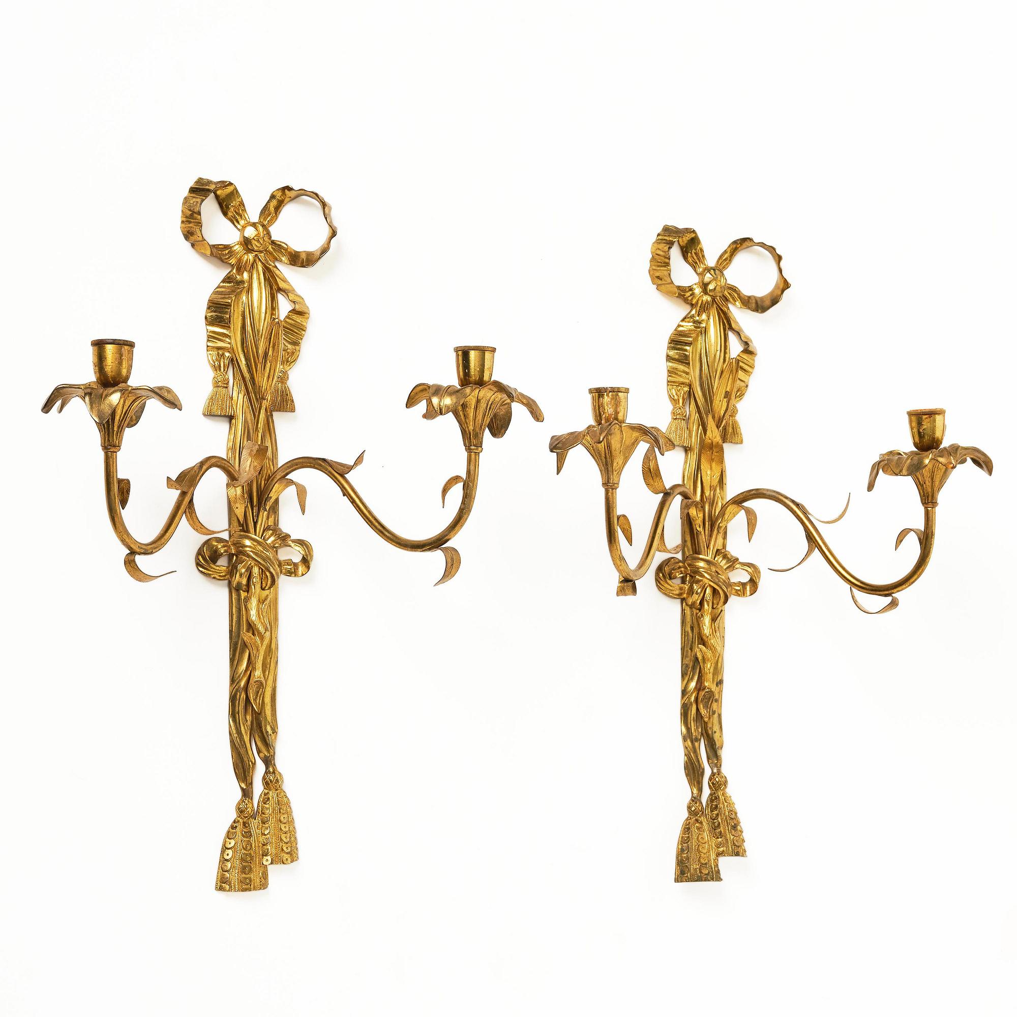 A pair of gilt bronze two-branch appliques after F. L. Rung, late 19th century,