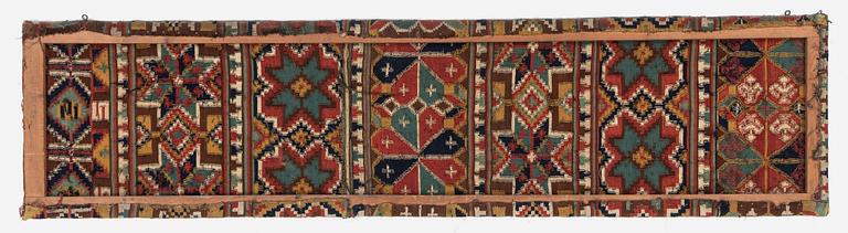 A flat weave 'Rosettes', Bench cushion c. 205 x 50 cm, Southwestern Scania, Sweden, first half of the 19th century.