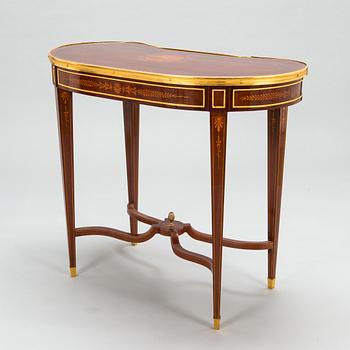 A Directoire style marquetry table from around year 1900.