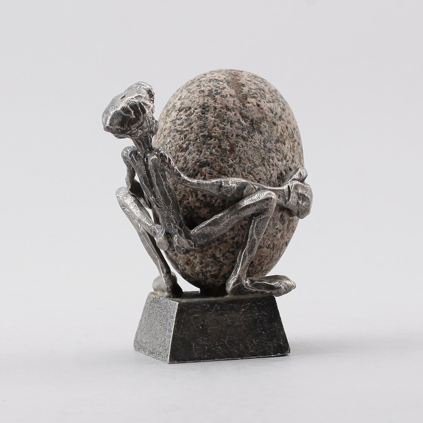 HENRY GUSTAFSSON, skulptur, "Lyftet", tenn och sten, 1989.