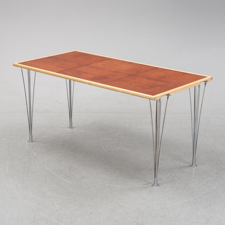 A birch and leather dining table produced by Mathsson International, 21th century.
