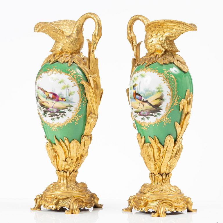 A pair of Louis XV-style gilt bronze and porcelain decorative ewers, France, later part 19th century.