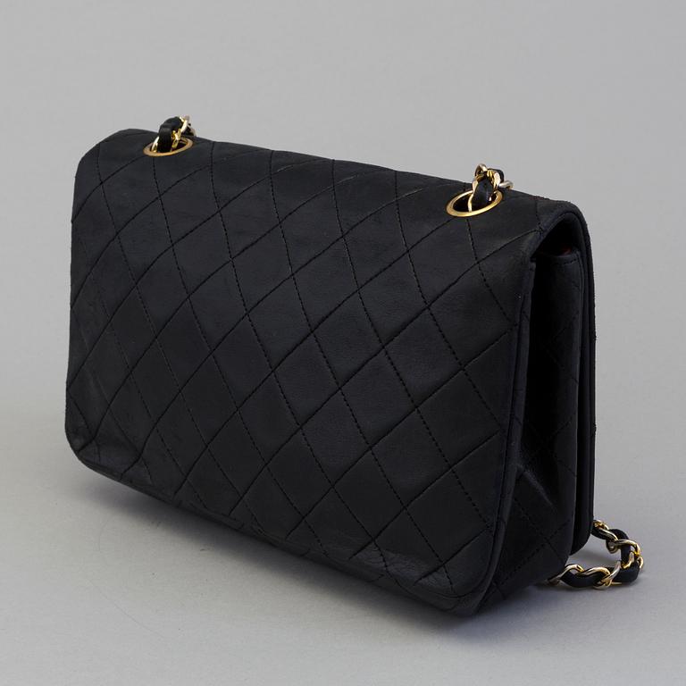 Chanel "Medium Classic Full Flap".