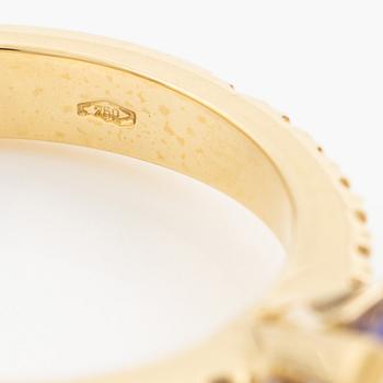 Ring 18K guld med tanzanit och briljantslipade diamanter.