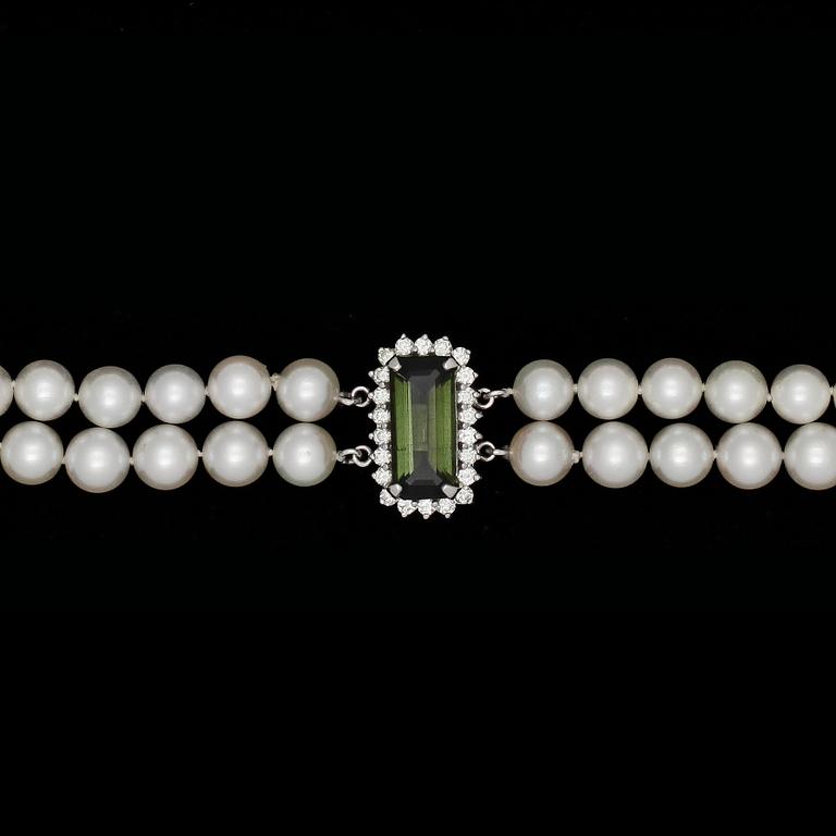 A two strand cultured pearl and diamond clasp necklace.