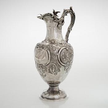 A sterling silver jug, maker's mark of Martin, Hall & Co, Sheffield 1877.