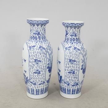 A pair of porcelain 21st century floor vases.