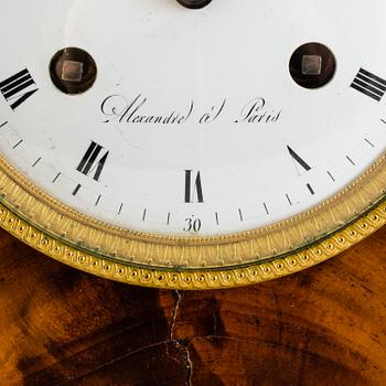 A French Empire mahogany mantle clock by Alexandre à Paris, first half of the 19th Century.